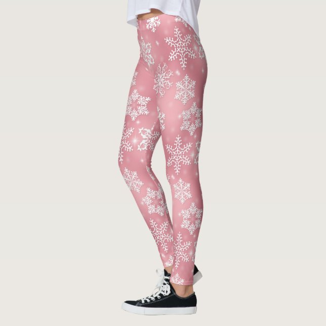 Pink snowflake pattern Christmas leggings (Left)