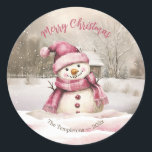 Pink Snowman Vintage Christmas Classic Round Sticker<br><div class="desc">This little snowman has the most beautiful smile as he enjoys the winter snow. "Merry Christmas". He is dressed up in a holiday pink knit cap and fringed scarf. This is a vintage watercolor with all editable text on this round sticker. Be sure the edit the example family name and...</div>