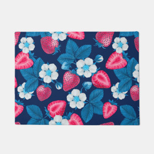 Pink strawberries on blue doormat