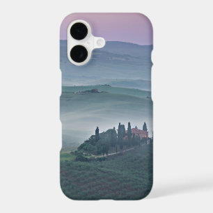 Pink sunrise over a Tuscany landscape