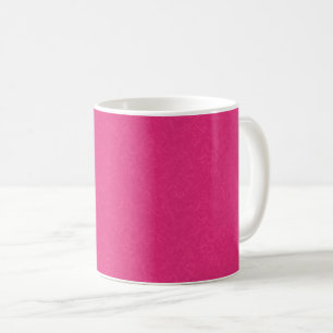 Pink textured surface with subtle swirling pattern coffee mug