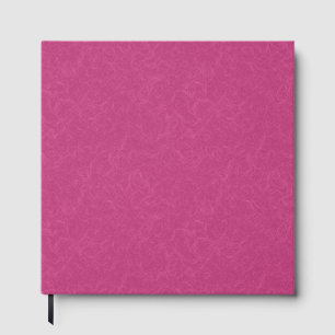 Pink textured surface with swirling pattern guest book