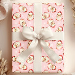Pink Vintage Santa Claus Face Watercolor Wrapping Paper<br><div class="desc">Wrap your gifts in festive cheer with our Pink Vintage Santa Claus Face Watercolor Wrapping Paper! This charming design features nostalgic watercolor illustrations of Santa Claus faces set against a vibrant background, adorned with delicate snowflakes. Perfect for adding a touch of vintage charm to your holiday presents, this wrapping paper...</div>