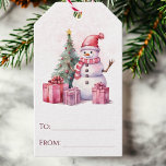 Pink Watercolor Snowman Scene Christmas<br><div class="desc">These Christmas gift tags feature an elegant watercolor snowman with beautifully wrapped presents and a decorated Christmas tree. Easily personalise these holiday gift tags by hand writing in the names in the "To" and "From" sections. Attach to presents, gift bags, and more for a chic and festive touch to your...</div>
