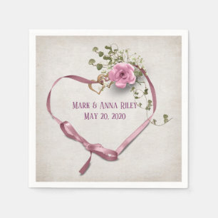 pink wedding ribbon heart with rings and rose napkin