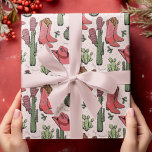 Pink Western Howdy Christmas Cowgirl Wrapping Paper<br><div class="desc">This fun and festive Western Howdy Christmas Cowgirl wrapping paper features hand-drawn illustrations of Xmas cowgirl boots,  hats,  mittens,  cacti,  holly berries and stars. All against an elegant very soft pink background.</div>