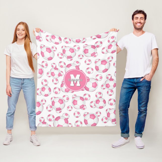 pink white girly sports soccer balls pattern fleece blanket (In Situ)
