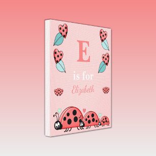 Pink with cute ladybirds and baby name canvas print