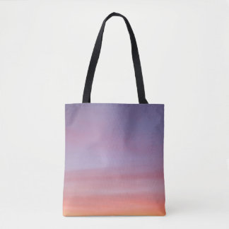 Pink, yellow, and purple cloudy sky tote bag