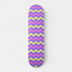 Pink, yellow, purple and pink skateboard