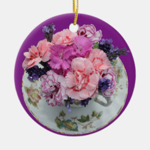 Pinks carnations in teacup ceramic tree decoration