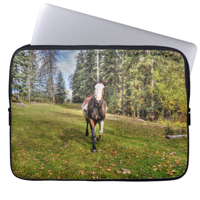 Pinto Ranch Horse Running in a Forested Field Laptop Sleeve (Front)