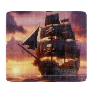 Pirate ship at sunrise/sunset  cutting board
