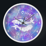 Pisces Fish Constellation Stars Name Birthday Gift Clock<br><div class="desc">This fun wall clock makes the perfect gift for anyone born under the zodiac sign Pisces. It includes two vintage fish, plus the constellation and space for the birthday person's name, all in white on a purple-pink starry background. Just use the easy template to add your personalised name. DESIGN TIP:...</div>