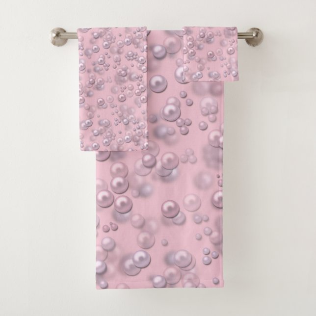 Placers of white-pink pearls on pink velvet bath towel set (Insitu)