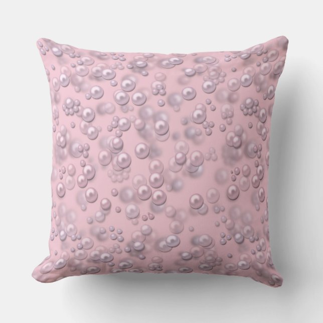 Placers of white-pink pearls on pink velvet cushion (Front)