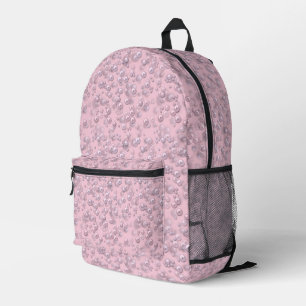 Placers of white-pink pearls on pink velvet printed backpack