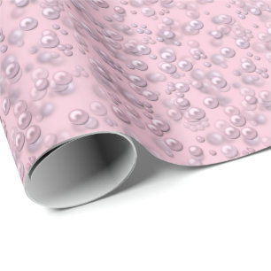 Placers of white-pink pearls on pink velvet wrapping paper