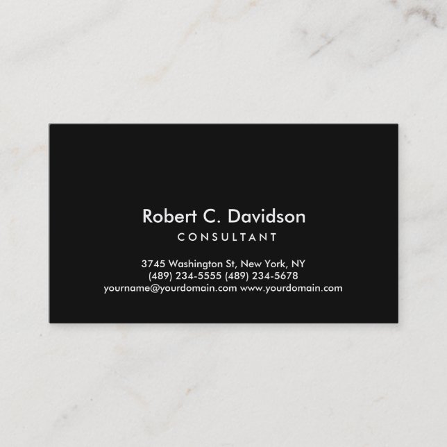 Plain Black Modern Consultant Business Card (Front)