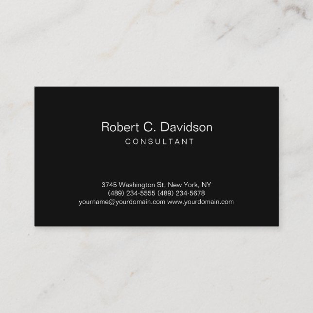 Plain Black Modern Consultant Business Card (Front)