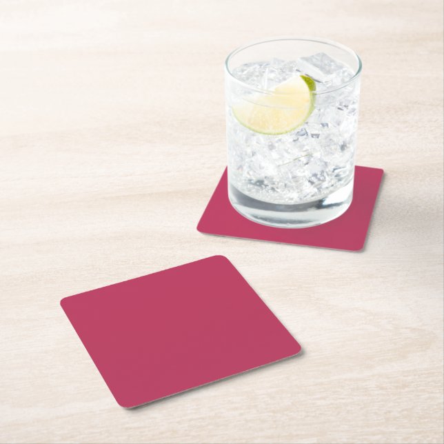 Plain colour deep rose pink square paper coaster (Insitu)