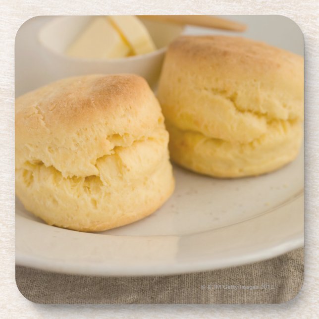 Plain scone with butter on plate coaster (Front)