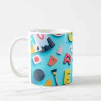 Plastic letters arranged artistically on a dark bl