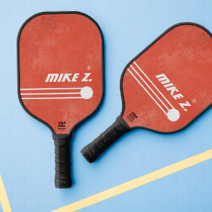 Player's Name on Aged Orange-Red Pickleball Paddle