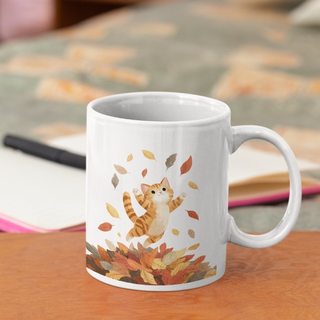 Playful Autumn Cat Mug Cute Gift (Playful cat enjoying autumn vibes — perfect cozy mug for cat lovers)