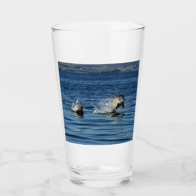 Playful Common Dolphins Porpoising Through Ocean  Glass (Front)