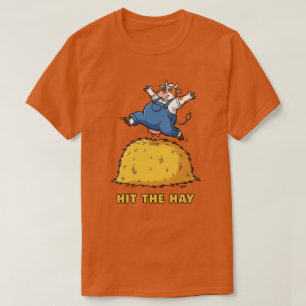 Playful Cow Jumping on Hay T-Shirt