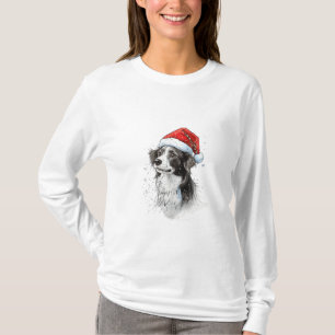 Playful Dog in Santa Hat with Snowflakes T-Shirt