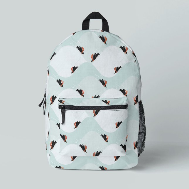 Playful Penguins Sliding on Snow Pattern Printed Backpack (Penguins sledding in the snow patterned backpack)