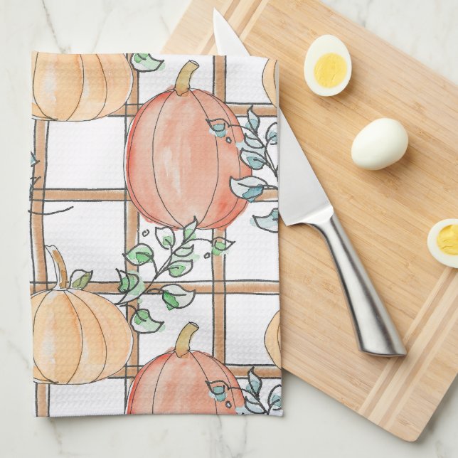 Playful pumpkin and plaid tea towel (Quarter Fold)