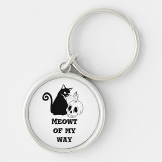 Playful White Keychain with Cat & Skull Design