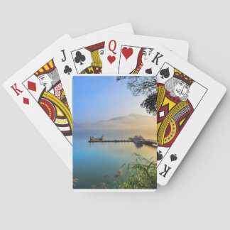 Playing cards with water scenery