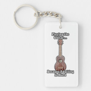 Playing guitar because adulting is hard. vintage key ring