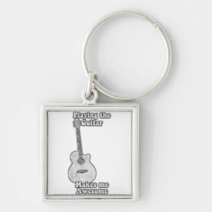 Playing the guitar makes me awesome. black & white key ring