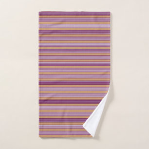 Plum and white five stripes pattern with tan hand towel