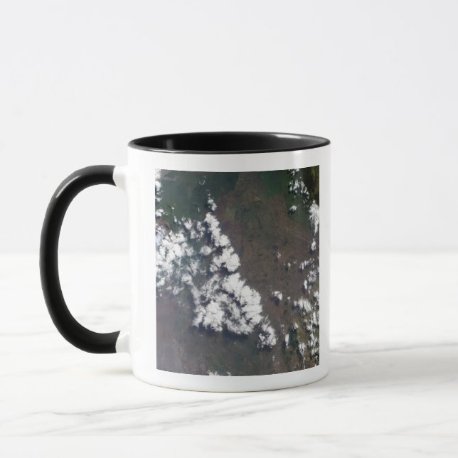 Plume rises from Nyiragongo Volcano in the DRC Mug (Left)
