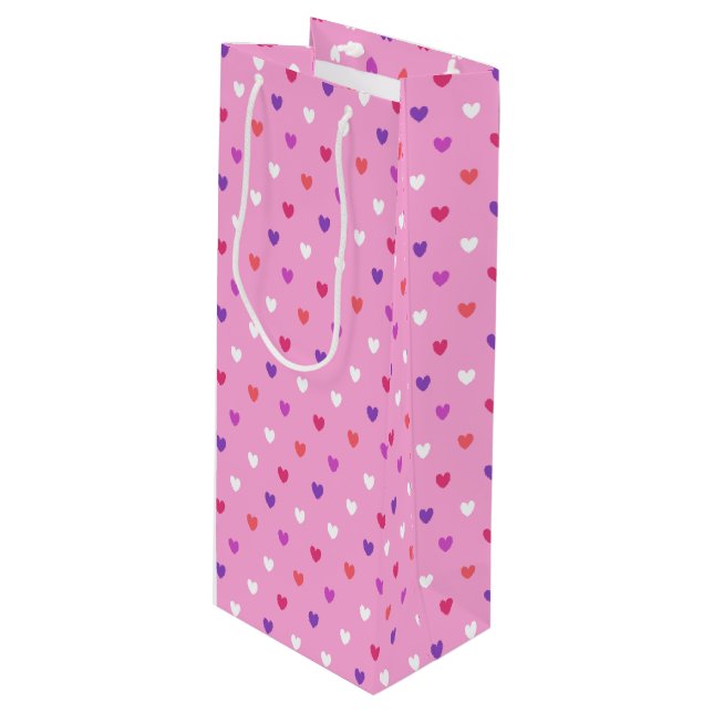 Polka hearts on pink wine gift bag (Front Angled)