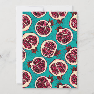 Pomegranate slices on turquoise