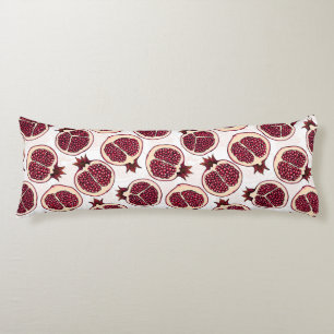 Pomegranate slices on white body cushion