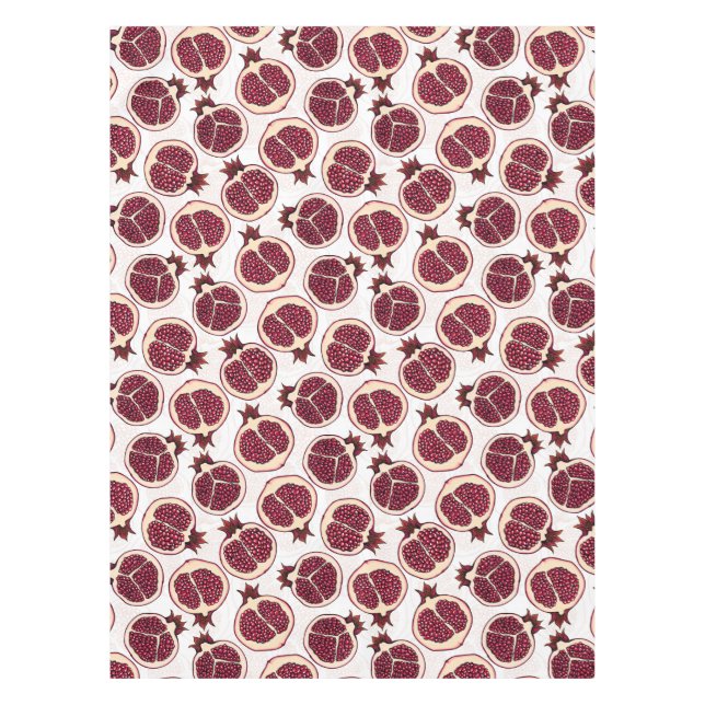 Pomegranate slices on white tablecloth (Front)