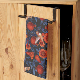 Pomegranates and hummingbirds/blue leaves on black tea towel