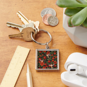 Pomegranates and hummingbirds/green leaves on blac key ring