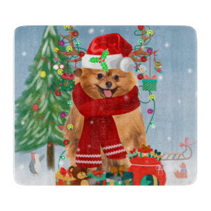 Pomeranian dog with Christmas gifts   Cutting Board