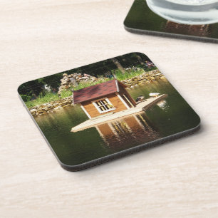 Pond with bird house and alphine slide coaster