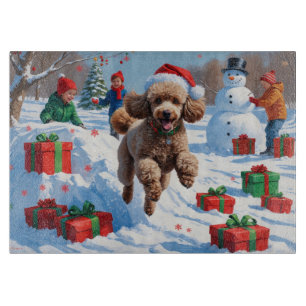 Poodle Running in Snow with Christmas Hat Cutting Board