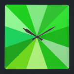 Pop Art Modern 60s Funky Geometric Rays in Green Square Wall Clock<br><div class="desc">This hip,  retro 60s-inspired pop art square clock has psychedelic green rays / sunbursts shooting out in a geometric pattern. There are twelve rays to mark the time - no need for numbers on this funky,  minimalist,  ultra-mod clock. It's groovy,  baby.</div>